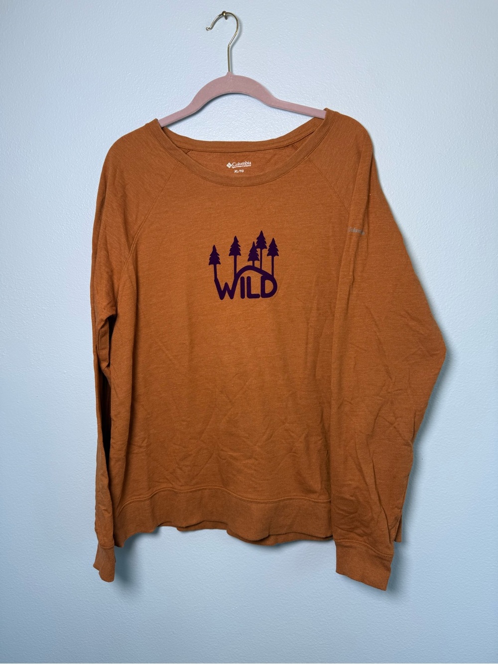 Columbia Women’s Rust Orange Crewneck Sweatshirt with Purple 'Wild' Graphic